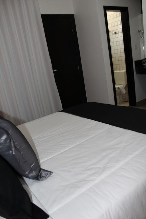 Hotel Dom Henrique Timóteo Buitenkant foto